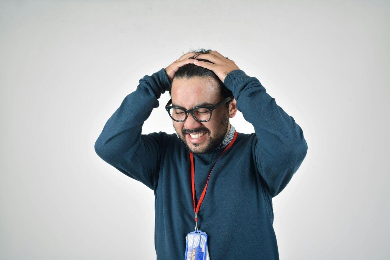 Hands on the head frustrated